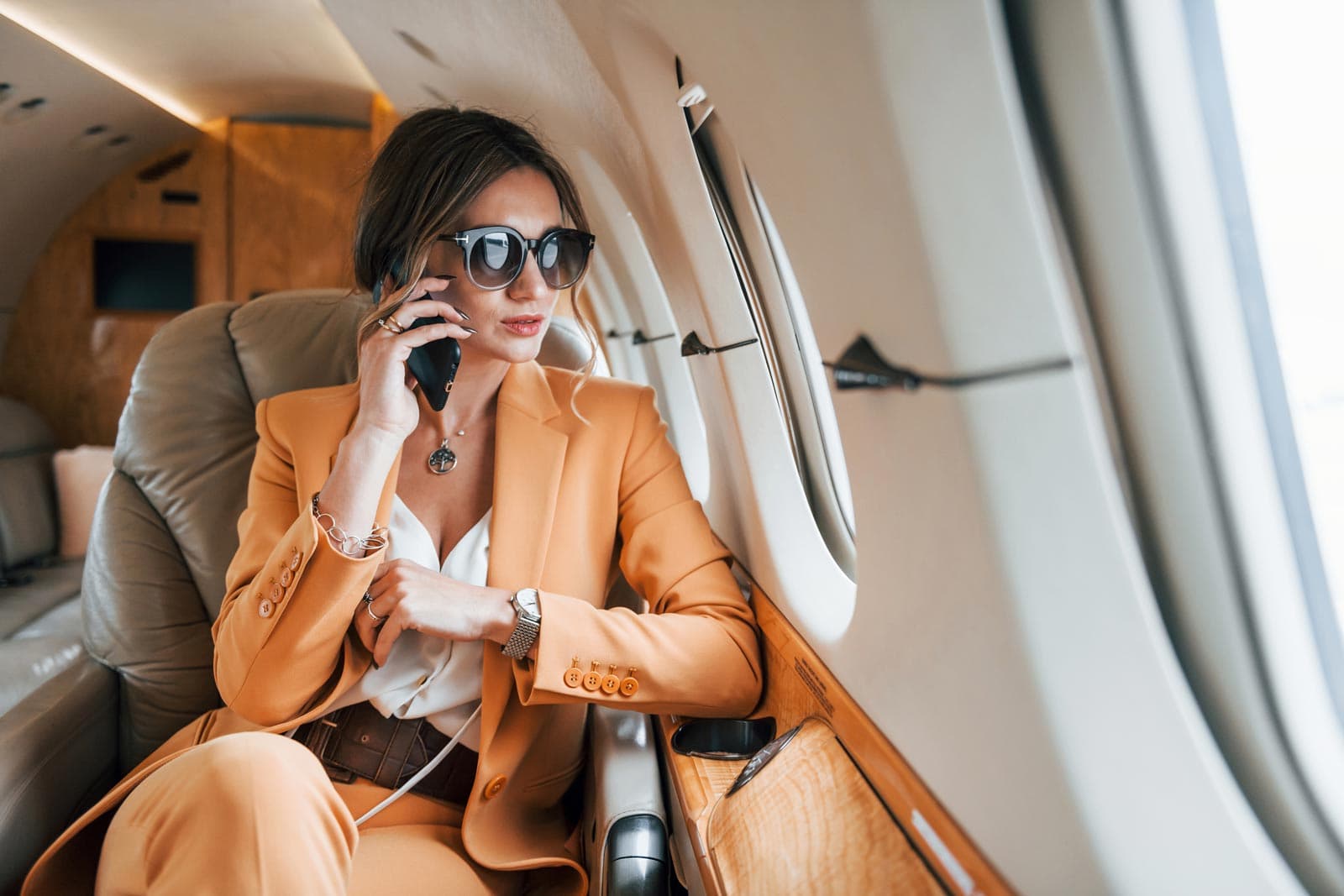 A passenger checking their phone