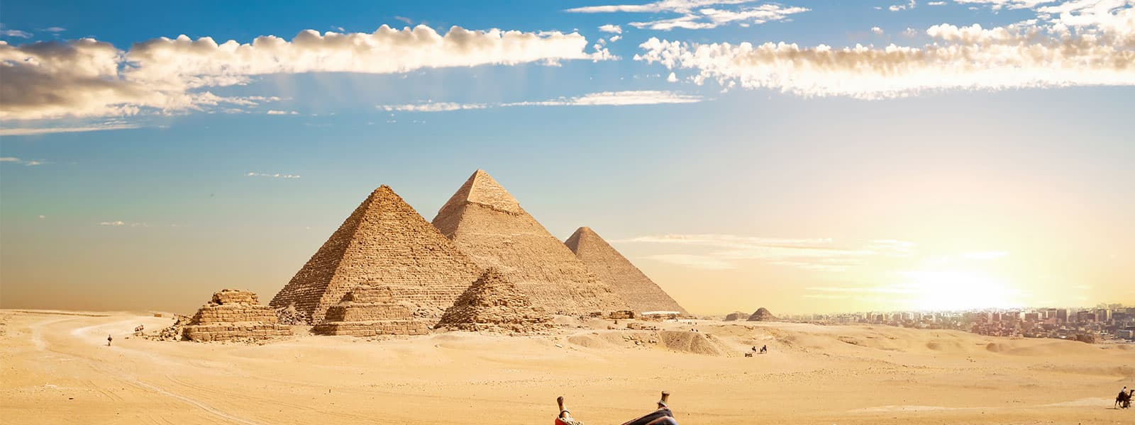 The Great Pyramids of Giza against the desert sky